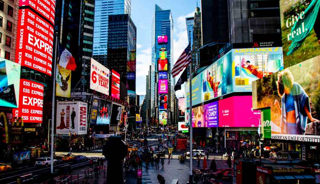 Quick — which glowing NYC junction is famous for its massive billboards and nonstop energy?