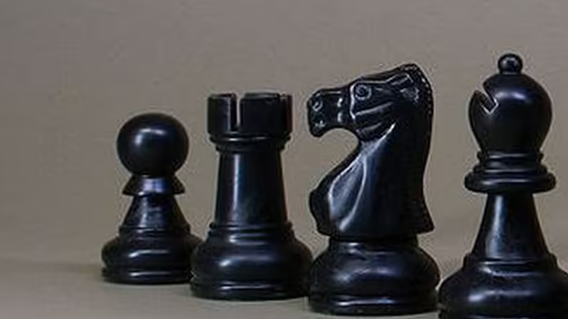 First instinct: which legendary strategy game uses these stylized figurines on the battlefield?