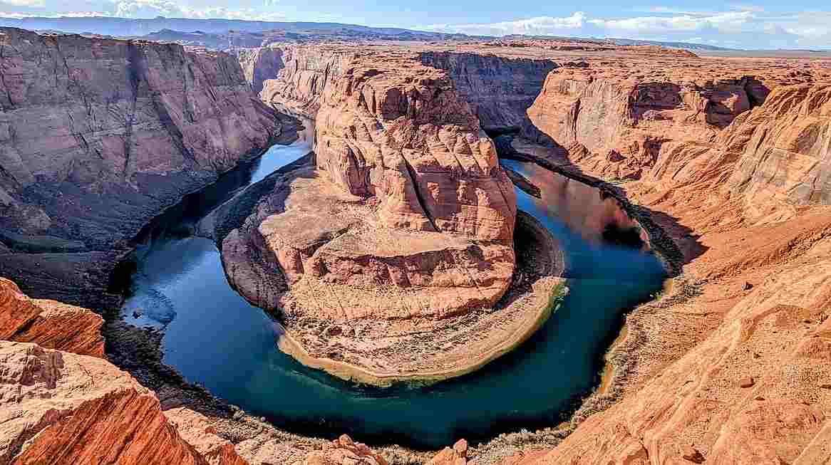 First instinct: which mighty river carved out the awe-inspiring depths of the Grand Canyon?