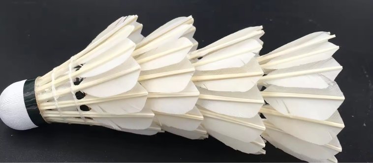 Quick — which athletic pursuit relies on a conically shaped shuttlecock for high-speed volleys?