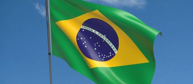 Blink and think — which South American nation flies this flag: a green field hosting a yellow diamond and a blue globe?