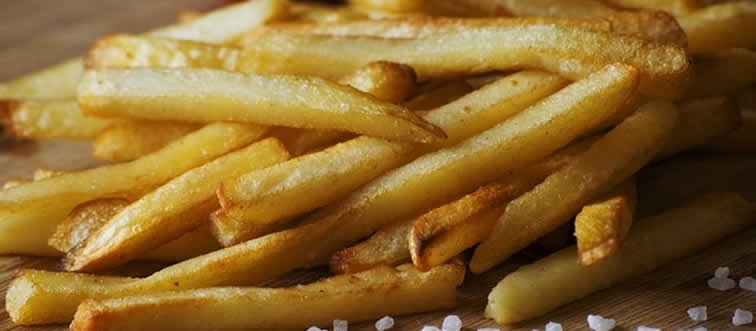 Blink and think — where did the iconic fried potato treat we call “French fries” actually get its start?