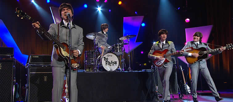 Quick — which legendary rock group earned the iconic moniker "The Fab Four"?
