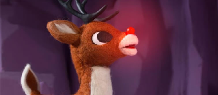 Lock in the clue — which famous red-nosed reindeer takes the lead to guide Santa's sleigh?