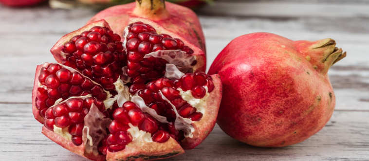 Blink and think — how do you properly spell this ruby-red, seed-filled fruit?