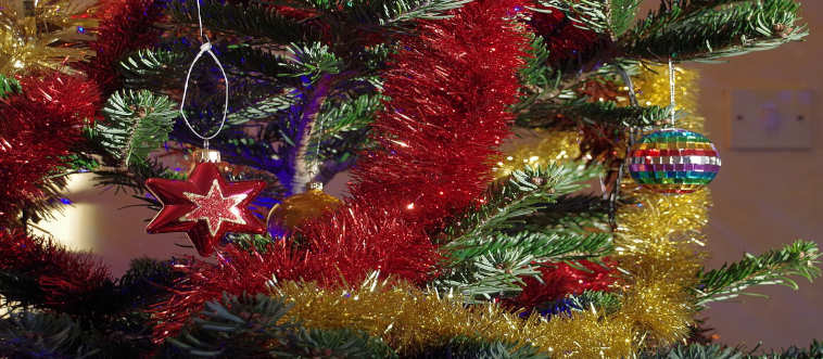 Blink and think — what do we call these shiny, metallic strands hung on retro tree branches?