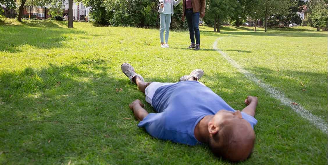 Blink and think — if someone suddenly drops and doesn't respond, what is your absolute first move?