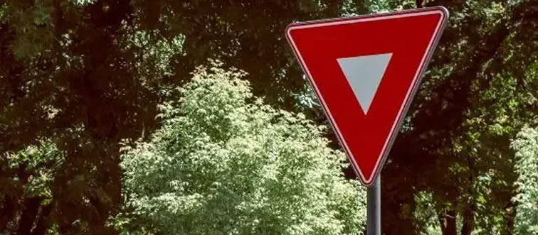 Blink and think — what message does this triangular symbol convey?