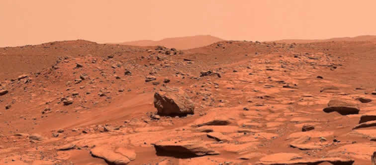 Blink and think: which celestial neighbor of ours is famously dubbed the Red Planet?