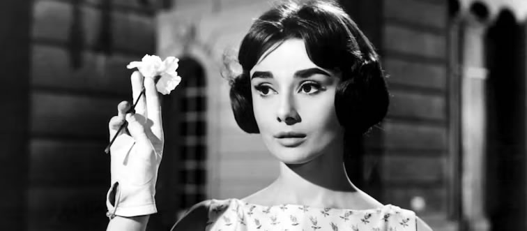 Blink and think — who is the silver-screen icon in this photo?